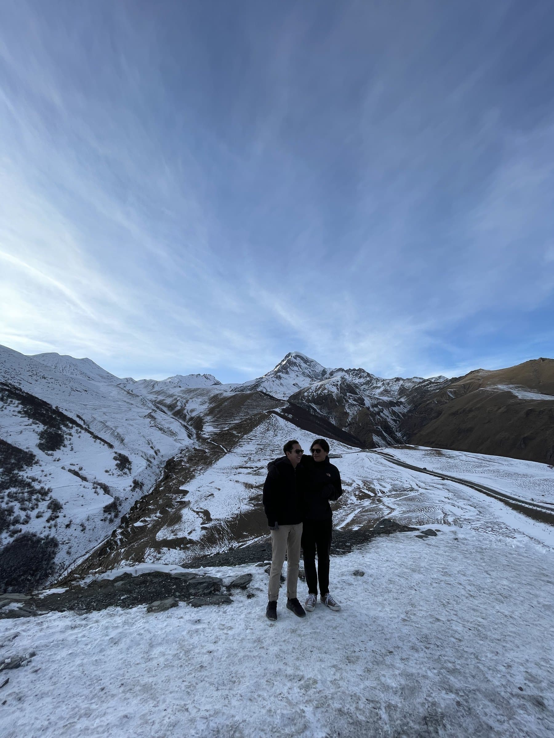 Emmanuel Mendieta standing on a snowy mountain pass near Tbilisi, Georgia